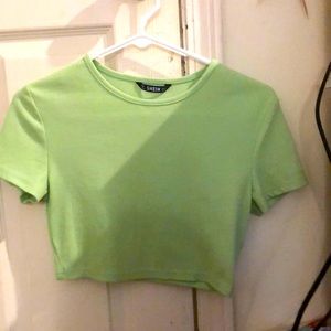 A cropped lime green crop top, never worn